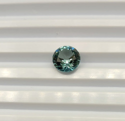 Топаз голубой c зеленоватым оттенком, круг 12 мм